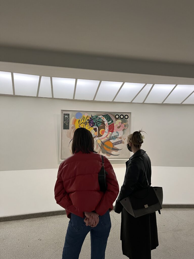 Two women viewing painting in Guggenheim 2022. Photo by Micaela Preble