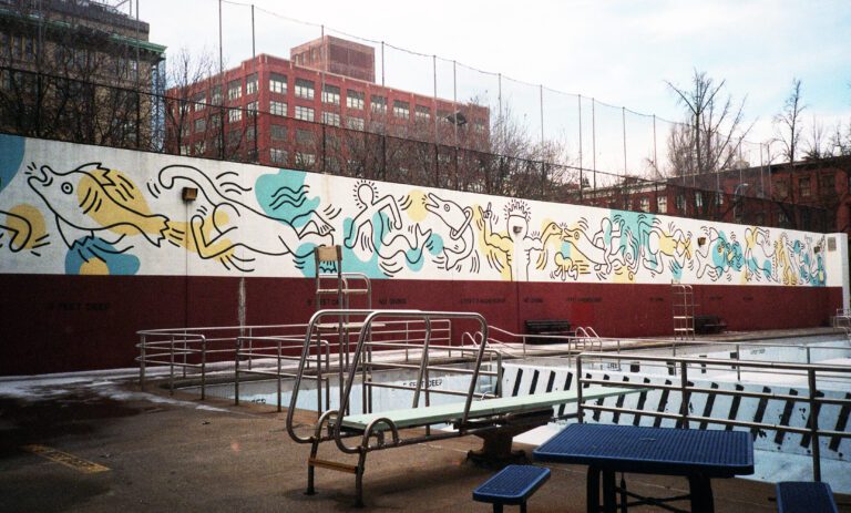Haring mural by the Carmine Street Swimming Pool. Neilson Abeel Jr / Alamy Stock Photo
